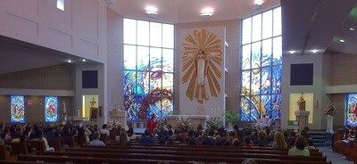 students celebrating mass